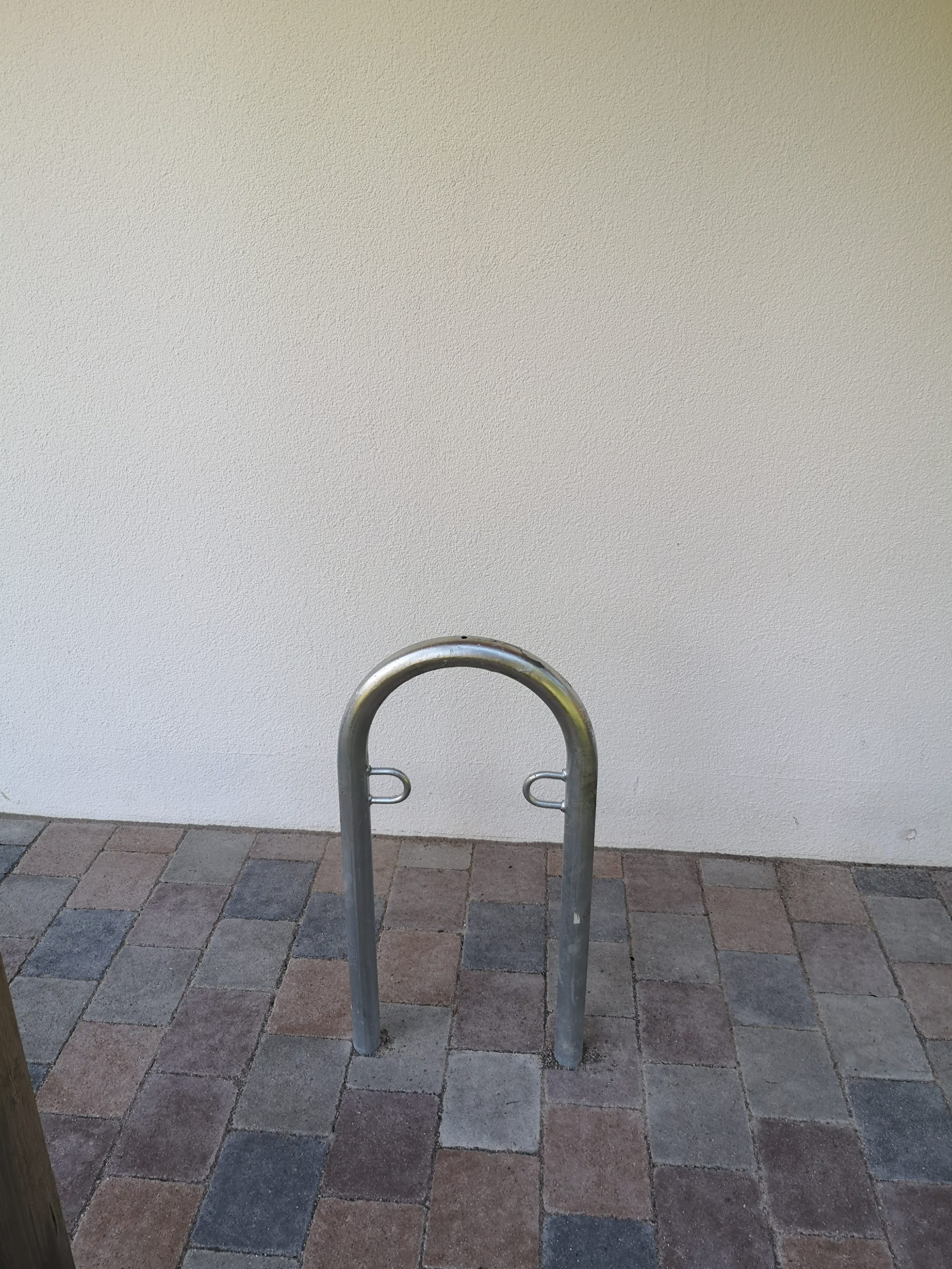 A bicycle hanger for two bicycles.